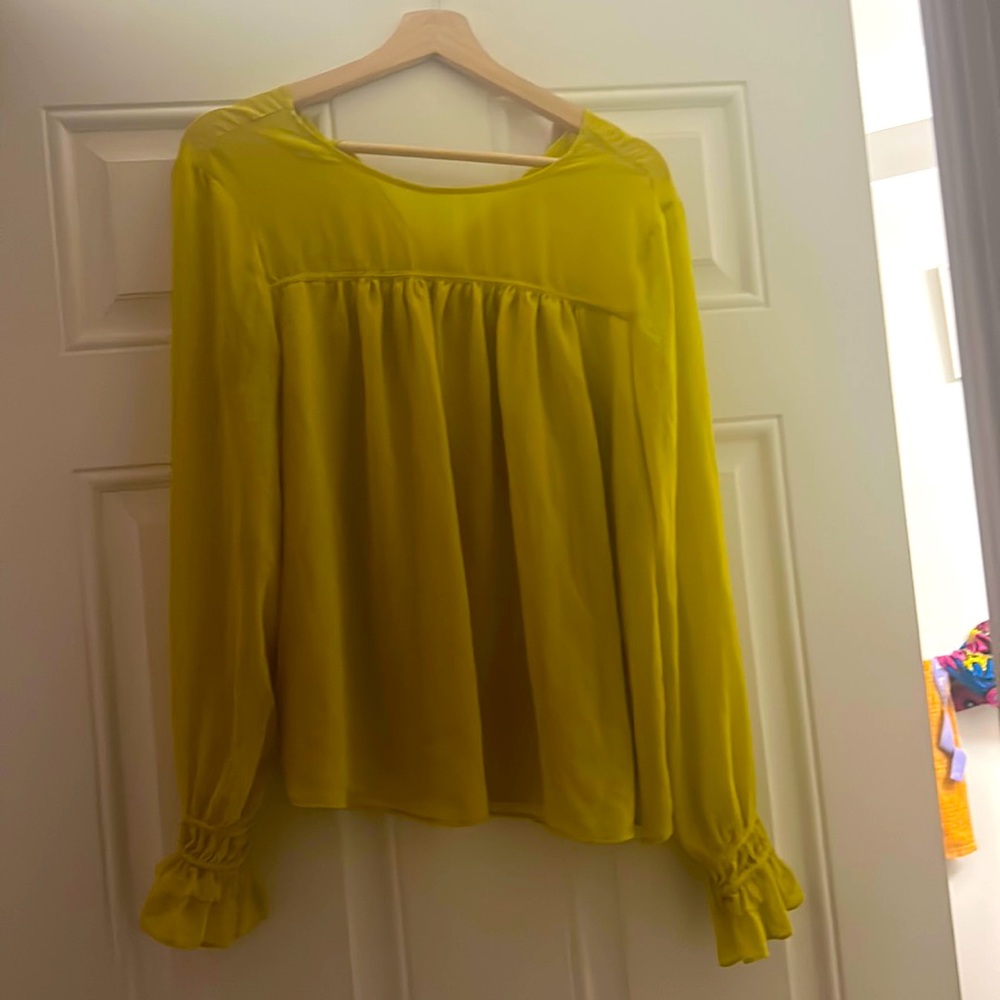 Love this top ,alpha top it can be dressed up or down